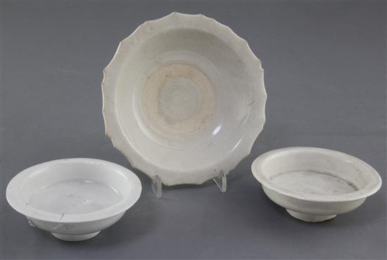 Two similar Qingbai small dishes or cup stands, Song dynasty, and a Qingbai type cup stand, Song / Yuan dynasty, 9cm and 13.3cm